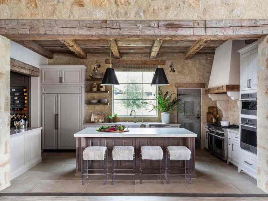 Antiques and salvaged supplies add a way of historical past to this new lakeside retreat